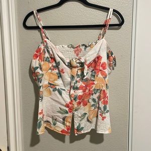 Camisole shirt with flower pattern.